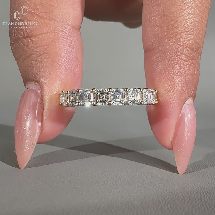 Half eternity wedding band in a simple prong setting.