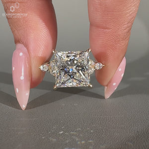 Princess Cut Diamond Ring marquise and round stones.
