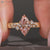 Marquise diamond ring with milgrain setting.