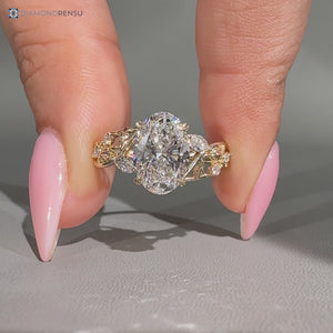 Oval diamond ring marquise and round side stones.
