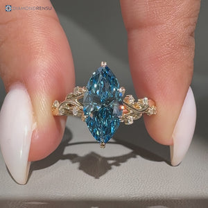 Marquise diamond ring with nature inspired details.