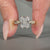 Handmade radiant cut diamond ring with twisted shank.
