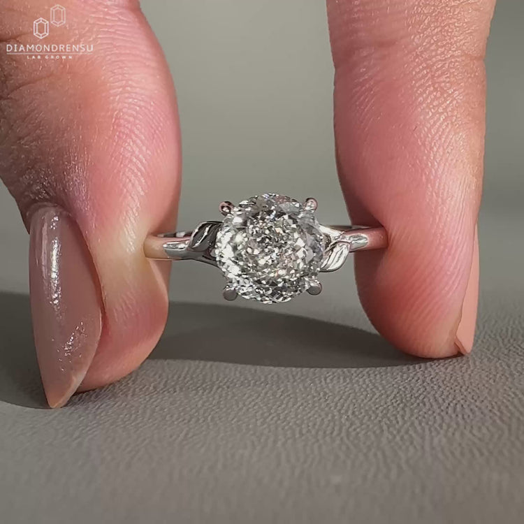 Solitaire engagement ring set in a white gold ring.
