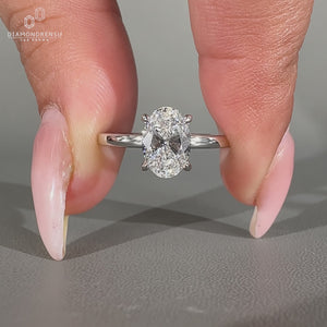 Oval engagement ring hidden halo round diamond style.