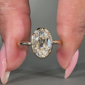 Oval old European cut diamond ring eight claw prong.
