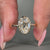 Oval old European cut diamond ring eight claw prong.
