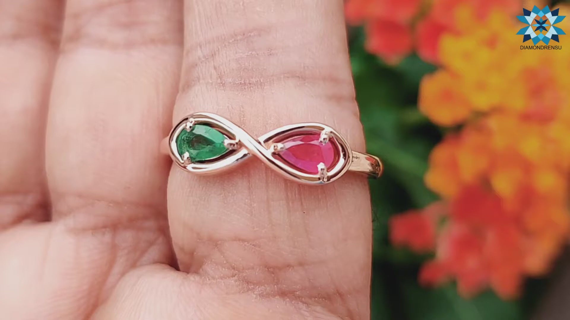 0.47 TW Pear Shape Ruby and Emerald Infinity Style Unique Wedding Band