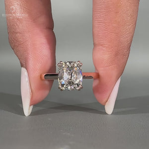 Cushion old cut ring solitaire cathedral double prong.