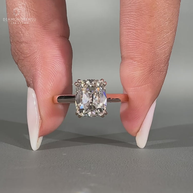 Cushion old cut ring solitaire cathedral double prong.