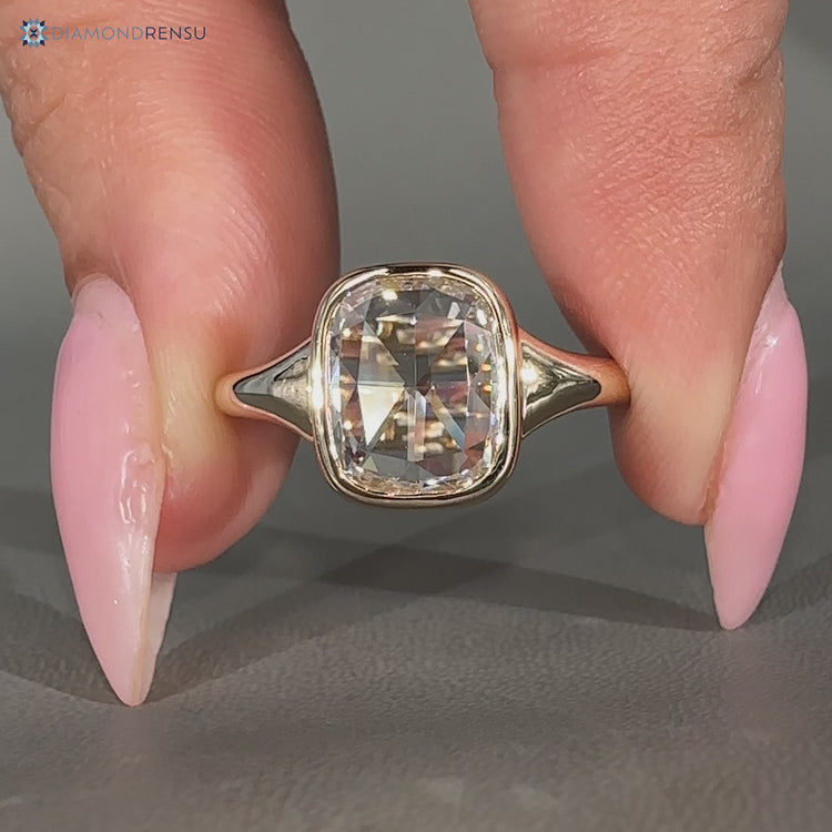 Cushion rose diamond ring tapered shank bezel set.