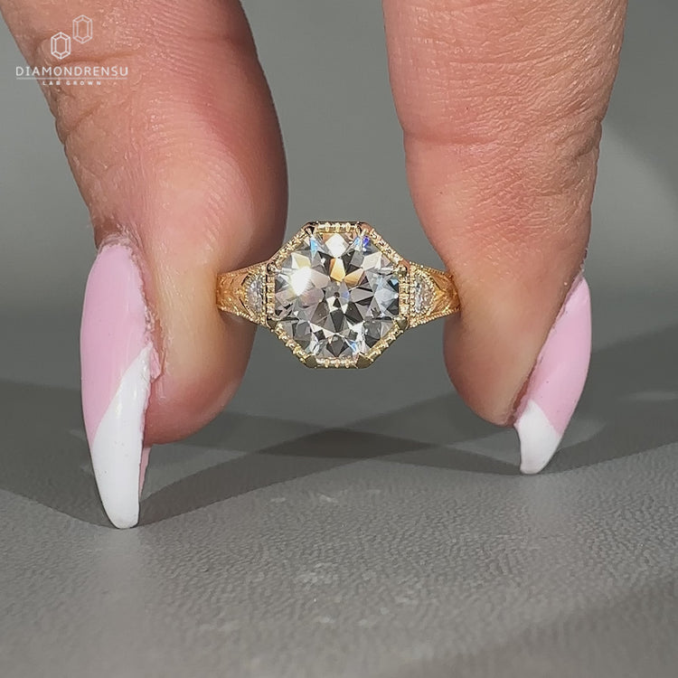 Three stone Octagon Old European Cut Lab Grown Diamond ring.
