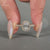 Oval Cut Diamond Ring in a yellow gold cathedral setting.
