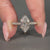 Handmade Dutch marquise diamond ring in cathedral setting.
