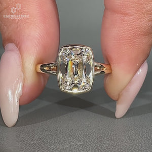 Cushion Old European Cut Ring bezel setting style.
