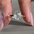 Oval rose cut diamond ring in milgrain ring setting.
