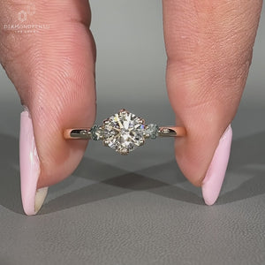 Round diamond ring moss agate three stone tapered shank.
