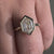 Solitaire engagement ring made in bezel engagement ring style.
