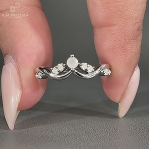 Moonstone Wedding Band featuring vintage-inspired prong setting.
