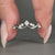 Moonstone Wedding Band featuring vintage-inspired prong setting.
