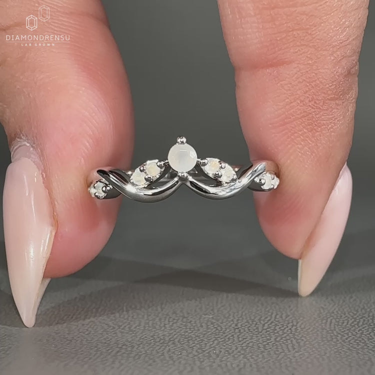Moonstone Wedding Band featuring vintage-inspired prong setting.
