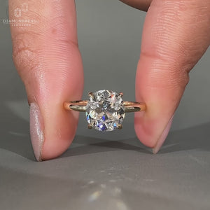 Cushion old cut diamond ring solitaire four claw prong.