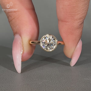 Handmade Round Old European Cut Ring with bezel setting.
