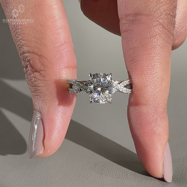 twisted pave engagement ring with round cut pave band.
