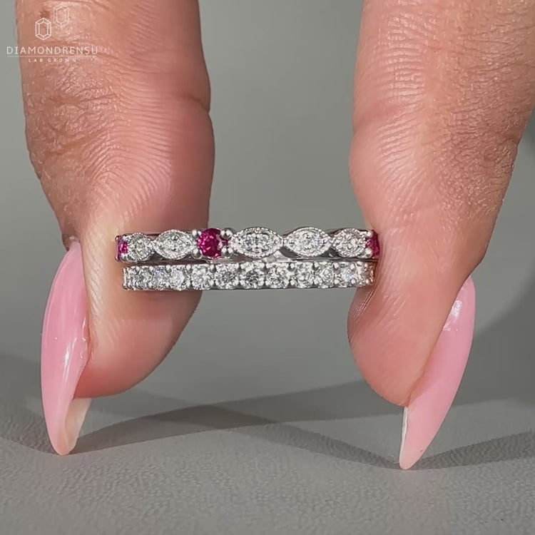 Ruby and diamond wedding band in white gold.