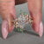 Dutch marquise bridal set with marquise and round side stones.