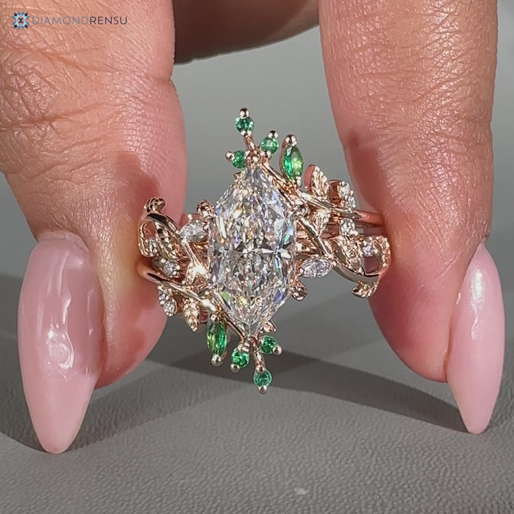 Dutch marquise bridal set with marquise and round side stones.