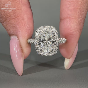 3 side pave setting on a white gold diamond ring.
