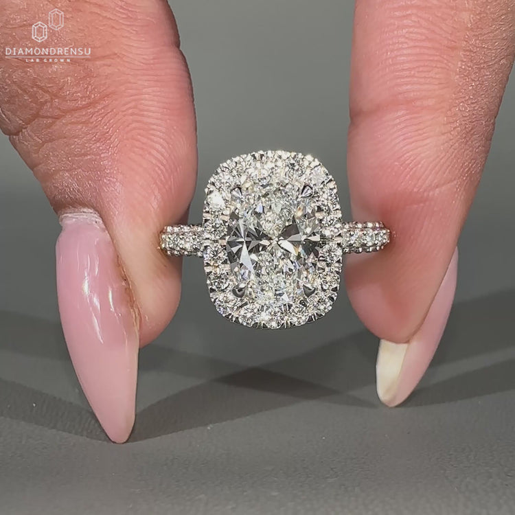 3 side pave setting on a white gold diamond ring.
