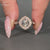 Round Cut Diamond Ring cathedral pave design.
