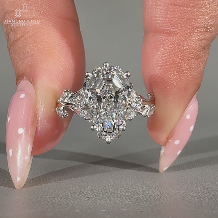 Coffin diamond ring nature inspired cluster style.