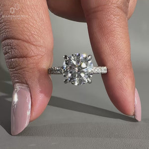 pave ring setting in white gold engagement ring.
