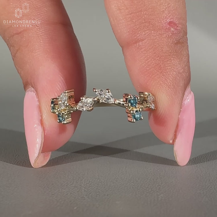 Marquise Cut Diamond Band in yellow gold cluster design.
