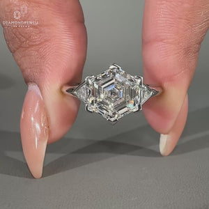 3 stone diamond ring with v prong setting.
