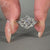 3 stone diamond ring with v prong setting.
