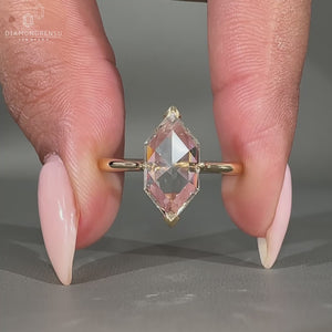 Dutch marquise cut ring with v prong setting in yellow gold.
