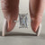 pave band engagement ring in 4 claw prong setting.

