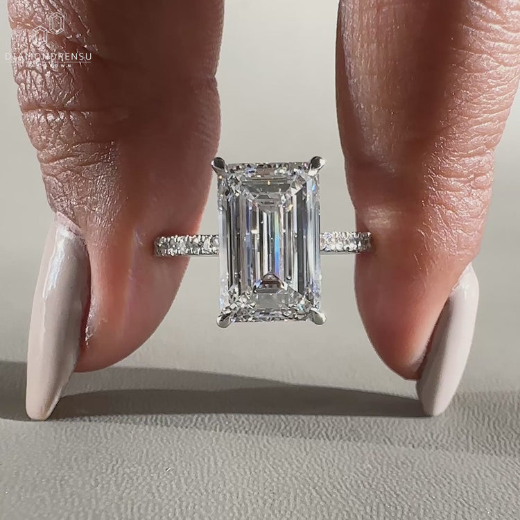 pave band engagement ring in 4 claw prong setting.
