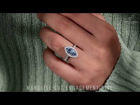 marquise cut diamond halo engagement ring