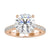 Round diamond engagement ring with a 4 prong round engagement ring style in a pave setting.
