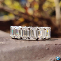 Beautiful emerald cut band designed for elegance, showcasing brilliant emeralds for a classic touch.