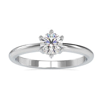 Elegant Six Prong Engagement Ring featuring a round diamond for timeless style.