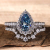 1.01 CT Fancy Blue Pear Cut Lab Grown Diamond Ring with Matching Curved Wedding Band