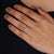 Woman's hand gracefully showcasing the vintage rose gold engagement ring