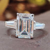 Cathedral Style 3.67 TW Emerald and Tapered Baguette Three Stones Engagement Ring