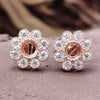 A Simple and Elegant 0.99 TW Round Moissanite Flower Style Wedding Earrings