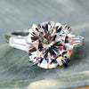 3.82 TCW Round Cut Moissanite with side Baguette Three Stone Engagement Ring